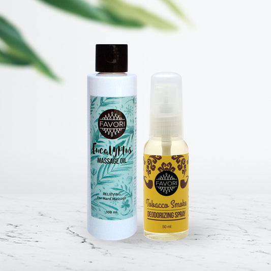 Two FAVORI Scents products on a table: eucalyptus massage oil and tobacco smoke air spray.