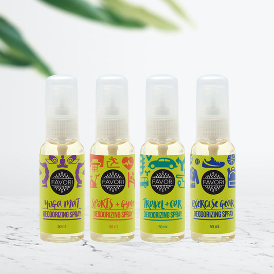 Four bottles of FAVORI Scents Air Spray (50ml) with different purposes and designs displayed on a surface, each a favorite in its category.