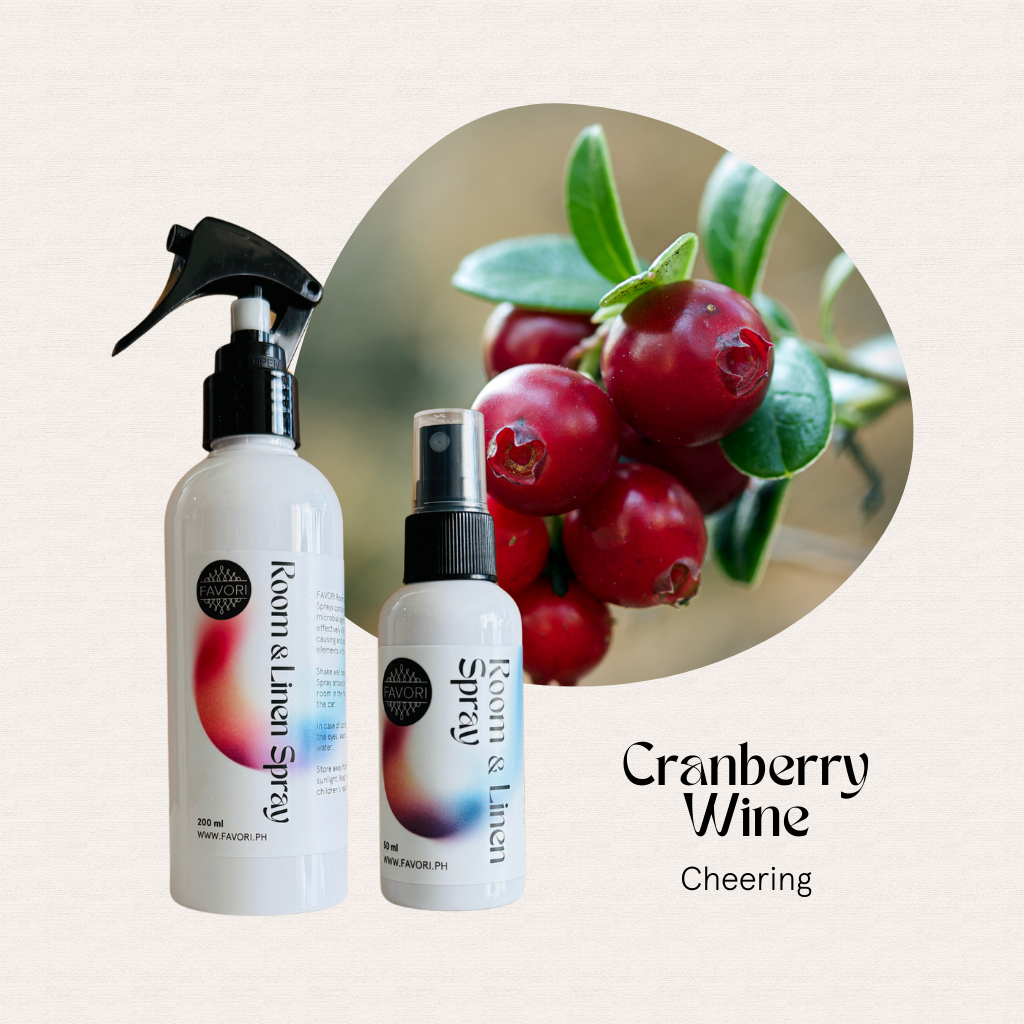 Two FAVORI Scents Regular Room & Linen Air Sprays, Cranberry Wine scent; text: Cheering, Odor Eliminator.