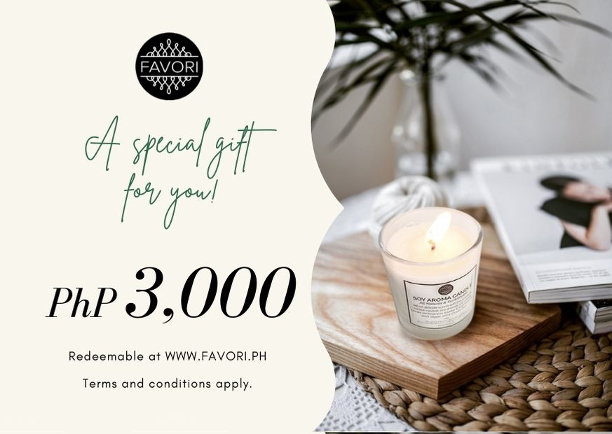 An advertisement featuring a FAVORI Scents All Occasion candle next to an open magazine on a wooden tray, with a potted plant in the background. Text reads "A special gift of choice for you! PHP 3,".