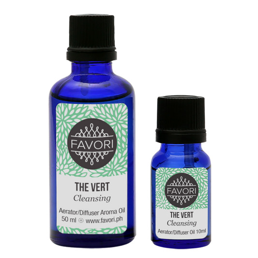 Two bottles of FAVORI Scents "The Vert Aerator/Diffuser (AD)" aroma oil in varying sizes.