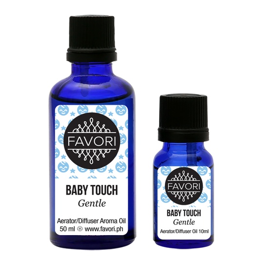Two bottles of FAVORI Scents Baby Touch Aerator/Diffuser (AD) Aroma Oil against a transparent background.