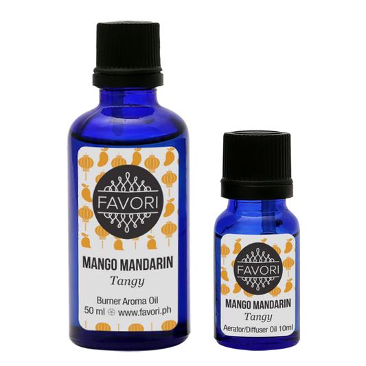 Two bottles of FAVORI Mango Mandarin Aerator/Diffuser (AD) scented aroma oil with labels indicating the scent and brand.