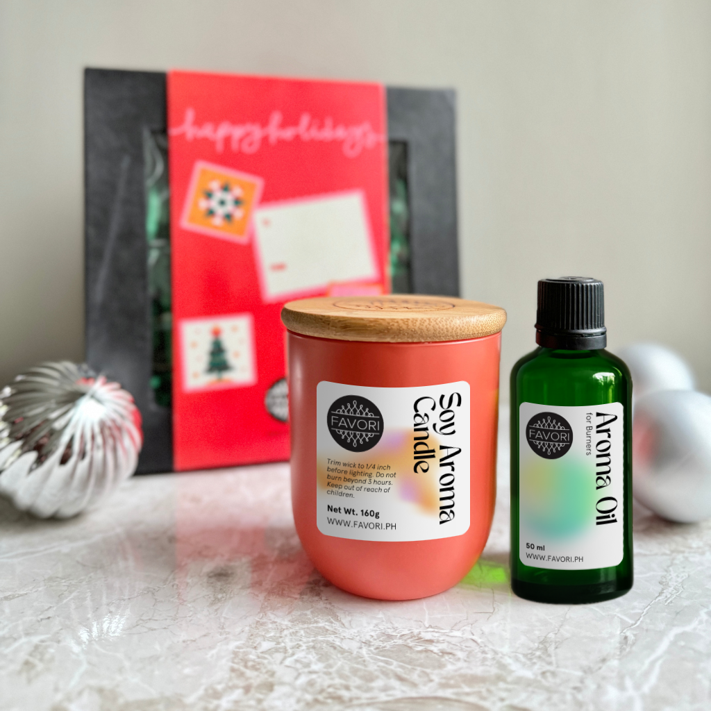 FAVORI Scents Burner Aroma Oil (50ml) + Soy Aroma Candle (160g) gift set with ornaments on marble.