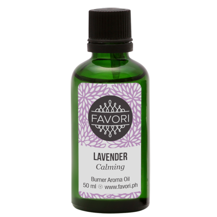 A bottle of FAVORI Scents Lavender Burner Aroma Oil with a label indicating it is a favorite for its calming effects.