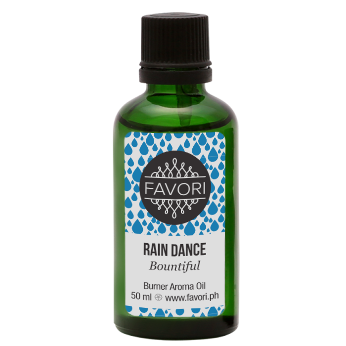 A bottle of FAVORI Scents Rain Dance Burner Aroma Oil, 50 ml.