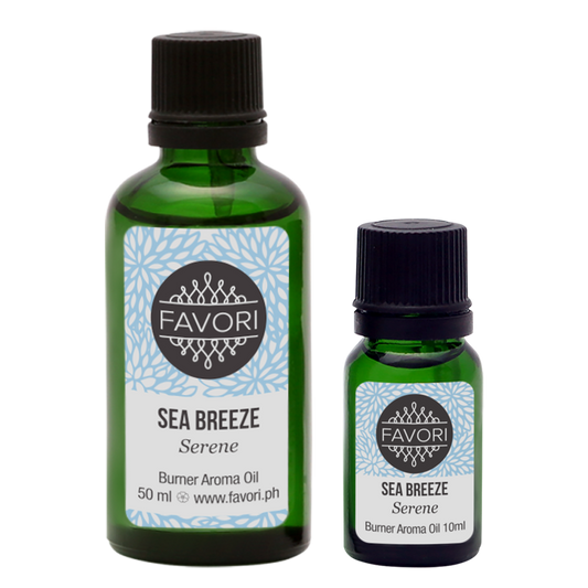 Two bottles of FAVORI Scents Sea Breeze Burner Aroma Oil in different sizes.