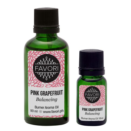 Two bottles of FAVORI Scents Pink Grapefruit Burner Aroma Oil in different sizes, labeled for balancing.
