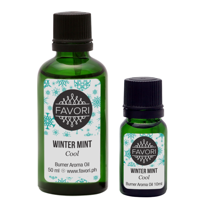 Two bottles of "FAVORI Winter Mint Burner" aroma oil in different sizes with labels showing usage details and website.
