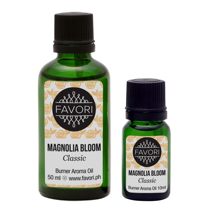 Two bottles of FAVORI Scents' Magnolia Bloom Burner Aroma Oil, each in a unique size.