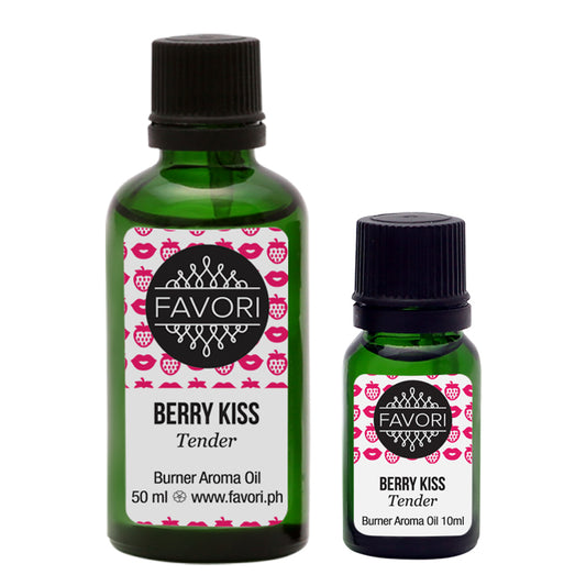 Two bottles of Berry Kiss Burner scented aroma oils in different sizes with labels indicating the FAVORI Scents brand and scent.
