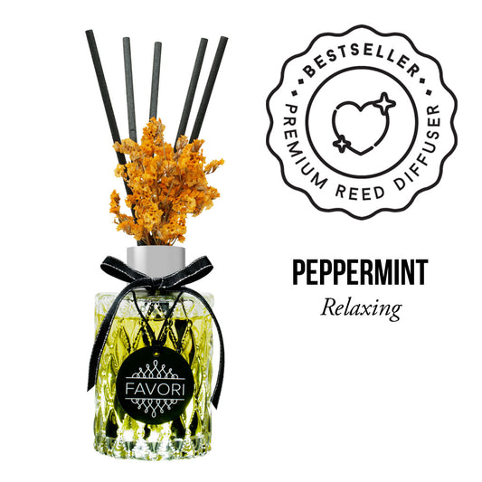A Peppermint Premium Reed Diffuser with decorative twigs, labeled as a FAVORI and purported to have relaxing qualities.