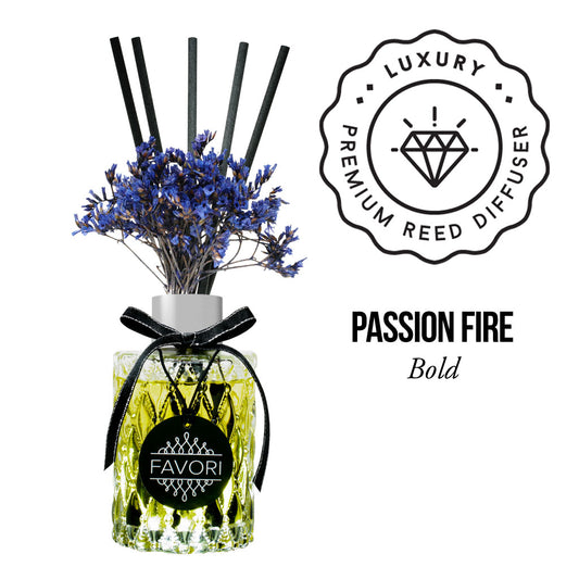 A PRD bottle with blue flowers and black reeds, labeled 'FAVORI,' with a stamp-like design stating 'luxury premium reed diffuser oil' - passion fire bold.