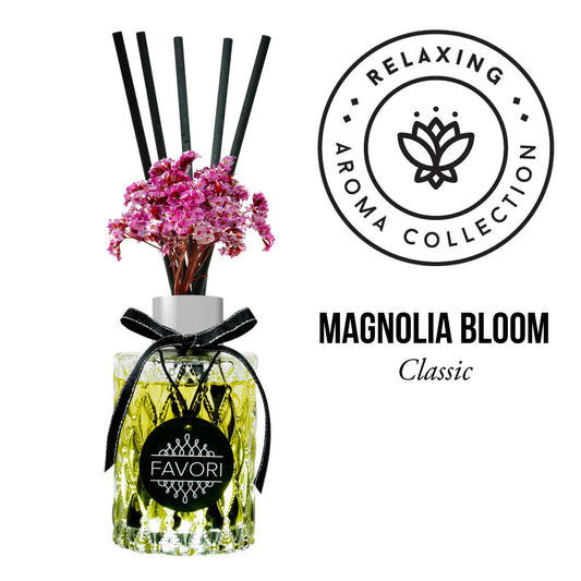 Decorative Magnolia Bloom Premium Reed Diffuser from the relaxing aroma collection by FAVORI Scents, adorned with pink blossoms.