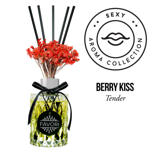 Aroma diffuser with reeds and red flowers, labeled "Berry Kiss Premium Reed Diffuser" from the sexy aroma oil collection by FAVORI Scents.