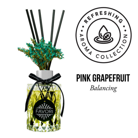Reed diffuser with Pink Grapefruit Premium Reed Diffuser (PRD) scent from FAVORI Scents' refreshing aroma oil collection.