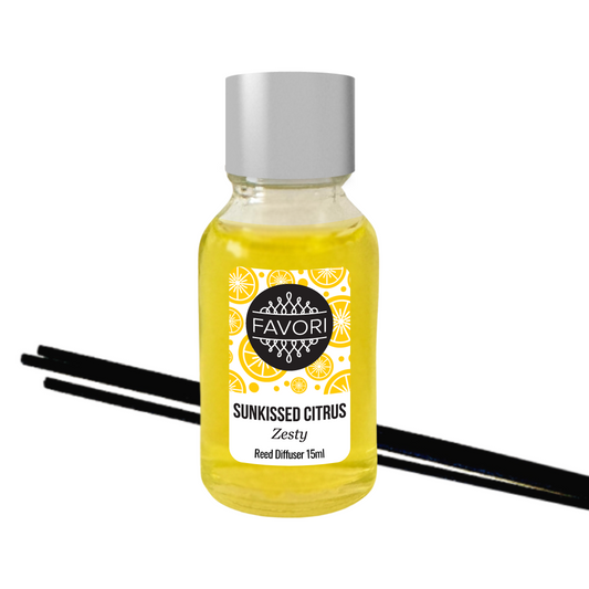 A bottle of FAVORI Scents Sunkissed Citrus Mini Reed Diffuser (MRD) oil with black fiber reed sticks, set against a white background.