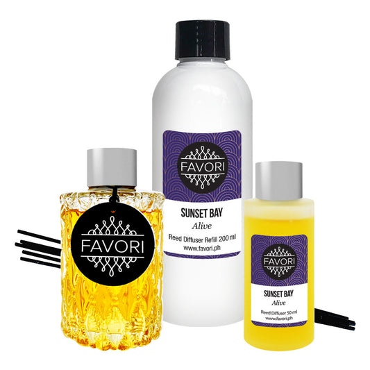 Three Sunset Bay Trio Reed Diffusers (TRD) from FAVORI Scents, including a refill bottle and a room spray, against a white background.