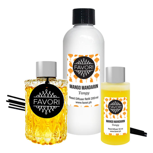 A set of Mango Mandarin Trio Reed Diffusers from FAVORI Scents, including a reed diffuser, aroma oil, and a spray bottle.