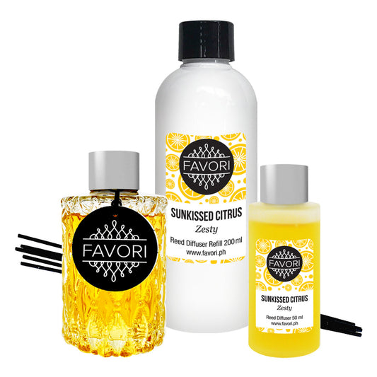 Sunkissed Citrus Trio Reed Diffuser (TRD) by FAVORI Scents, featuring a reed diffuser, an oil refill bottle, and a small spray bottle with a sunkissed citrus aroma.
