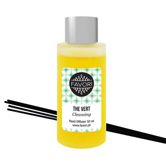 A bottle of FAVORI Scents The Vert Regular Reed Diffuser (RRD) oil with black reeds, 50 ml size.