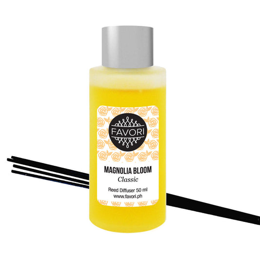 A bottle of Magnolia Bloom RRD by FAVORI Scents with black sticks.