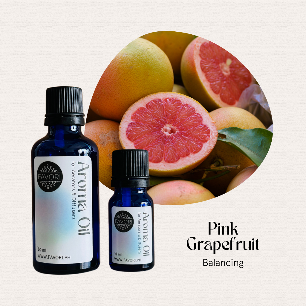 Two bottles of FAVORI Scents Pink Grapefruit AD Aroma Oil, ideal for use in aerators or diffusers.