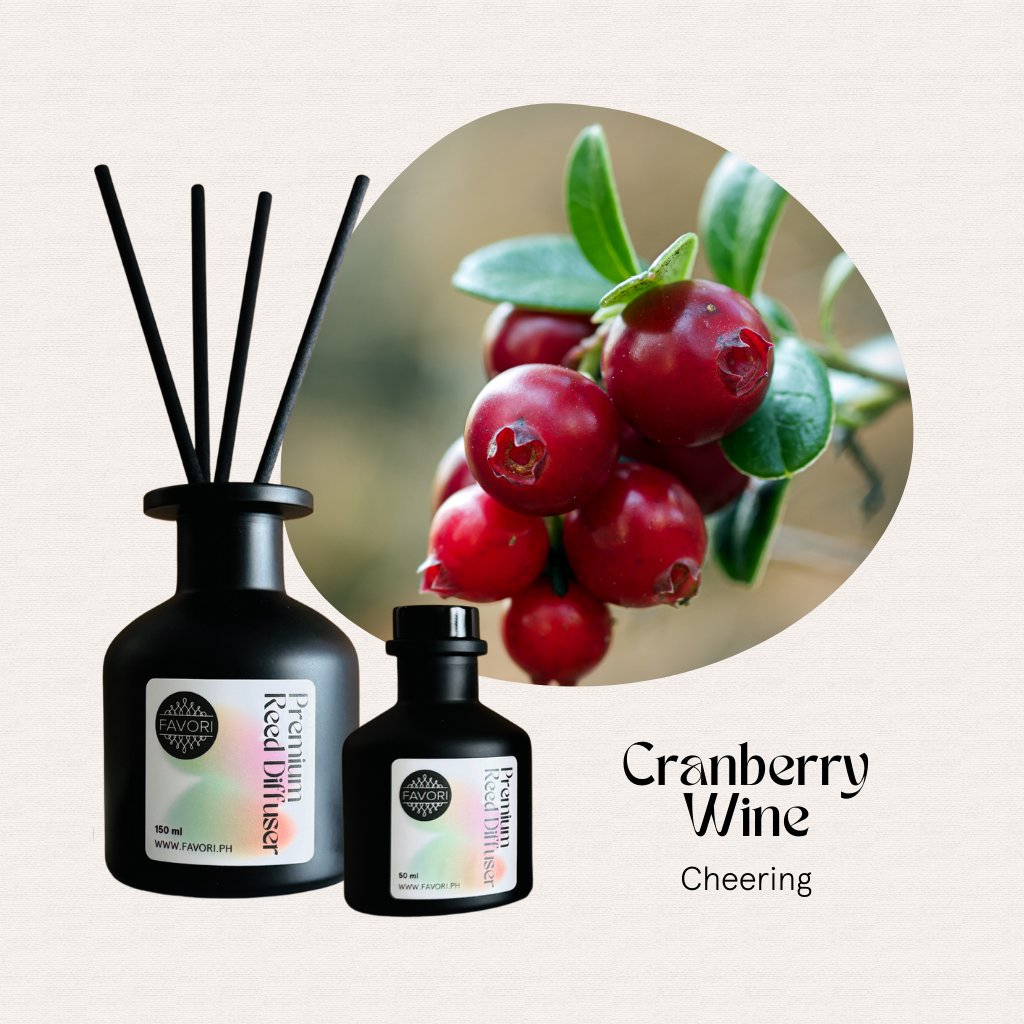 Two black FAVORI Scents Cranberry Wine PRD bottles with fiber reeds, offering long-lasting fragrance.