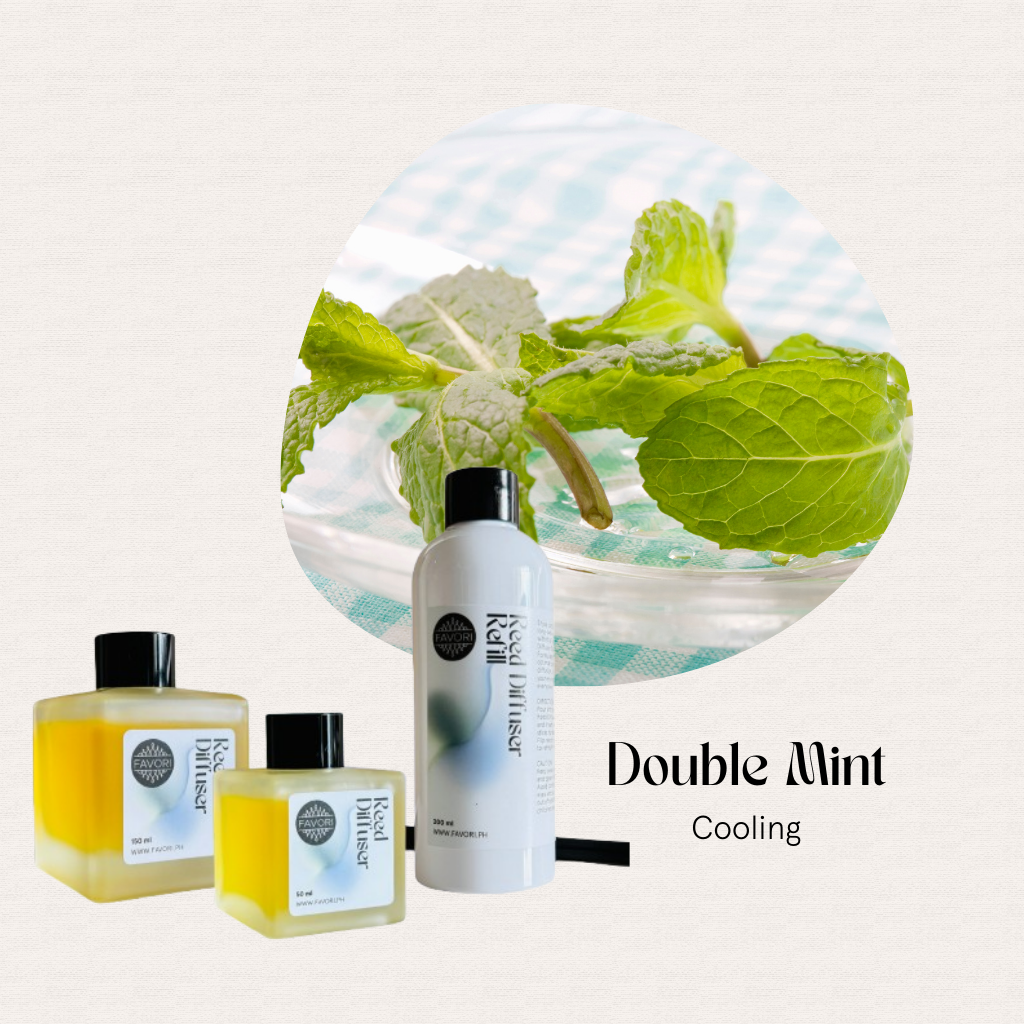 Three Double Mint Trio Reed Diffusers by FAVORI Scents beside mint leaves; enjoy a long-lasting fresh aroma.