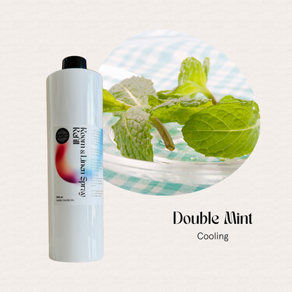 White FAVORI Scents Refill – Regular Room & Linen Air Spray 500ml beside mint leaves, text: “Double Mint.”.