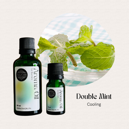 Two green bottles of FAVORI Scents Burner Aroma Oils in Double Mint Cooling with long-lasting mint aroma.