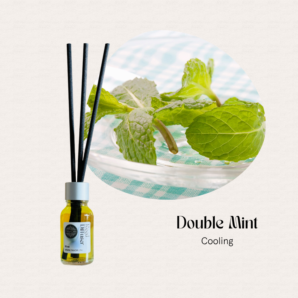 A FAVORI Scents Mini Reed Diffuser, Double Mint Cooling, with fiber sticks and mint leaves.