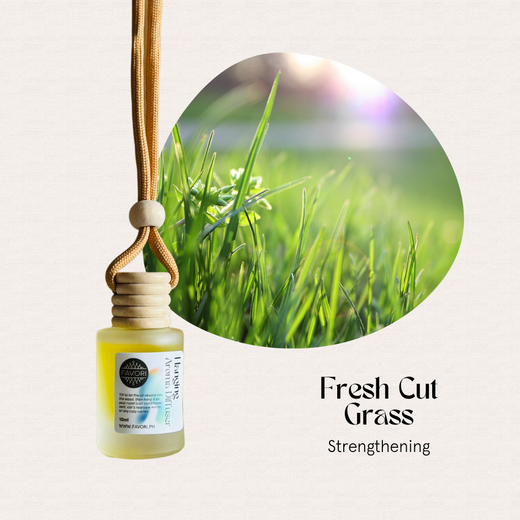 FAVORI Scents Hanging Aroma Diffuser: Fresh Cut Grass, portable bottle with sunlit grass photo.