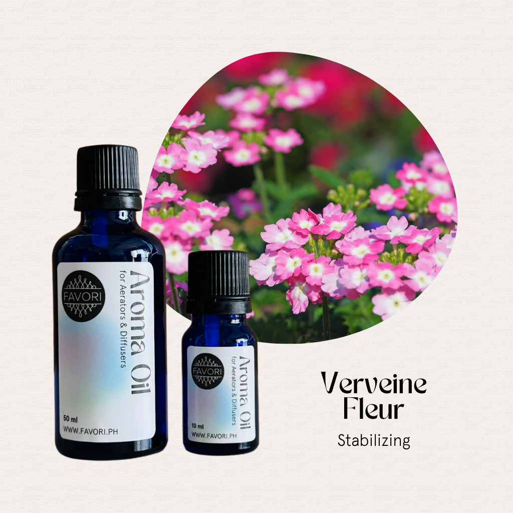 Two blue bottles of FAVORI Scents AD Aroma Oils with pink verbena flowers and Verveine Fleur Stabilizing text.