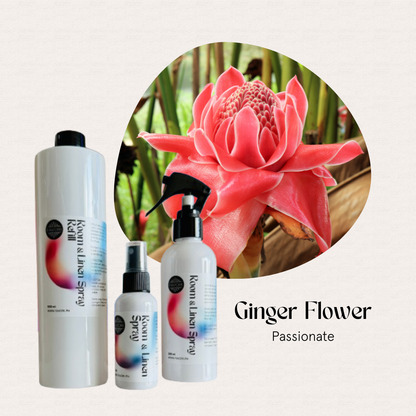 Three FAVORI Scents Trio Room & Linen Air Spray bottles beside a pink ginger flower, expressing freshness.