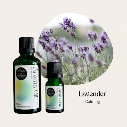 Two green FAVORI Scents Burner Aroma Oils with blooming lavender, perfect for burners. Lavender Calming.