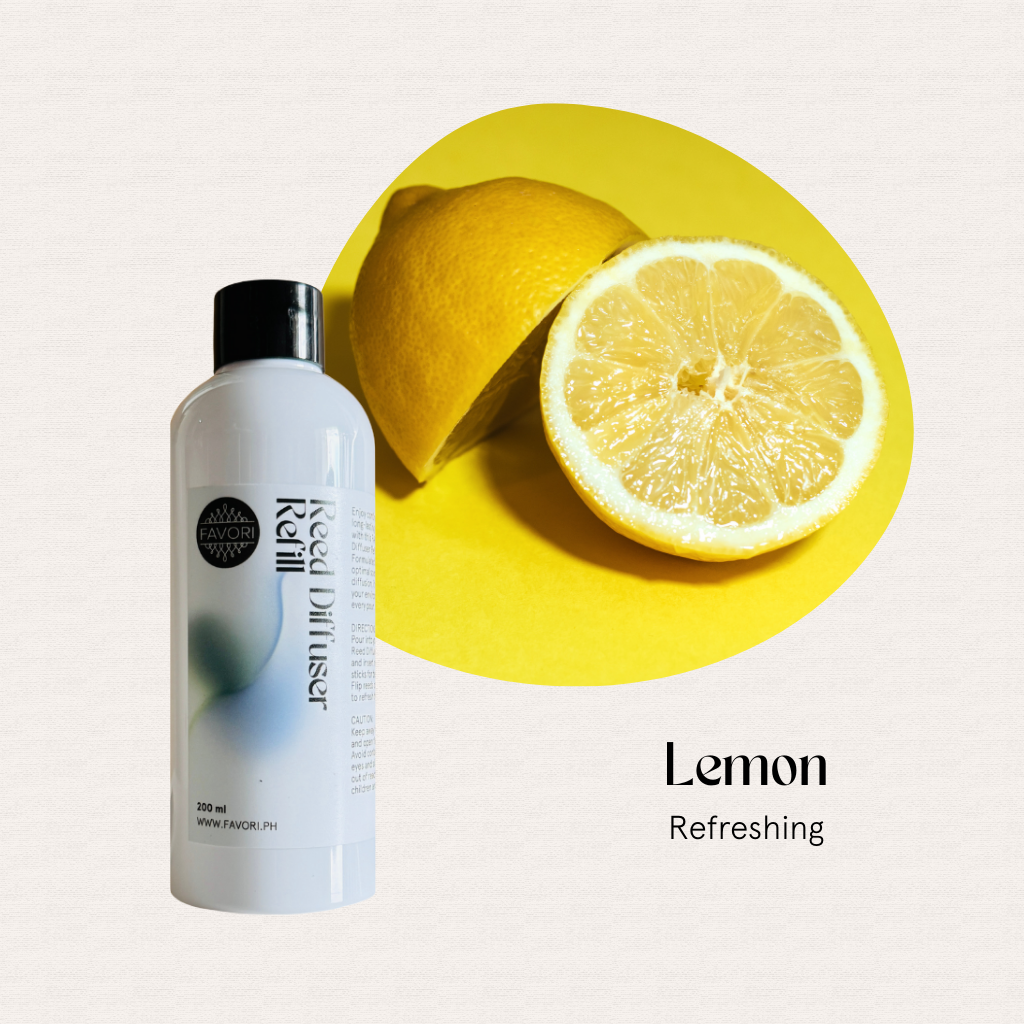 FAVORI Scents Lemon Reed Diffuser Refill (RDR) with fiber reed sticks, shown beside a halved lemon on yellow.