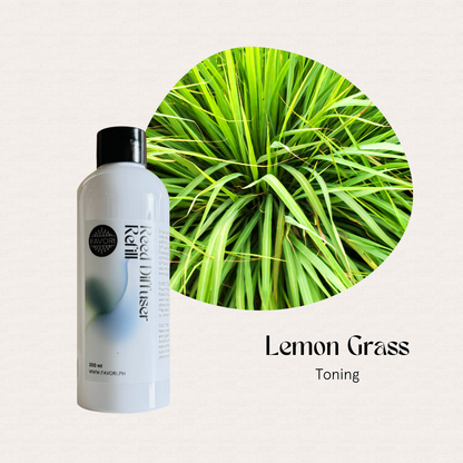 FAVORI Scents Lemon Grass Reed Diffuser Refill with fiber sticks beside fresh lemongrass.