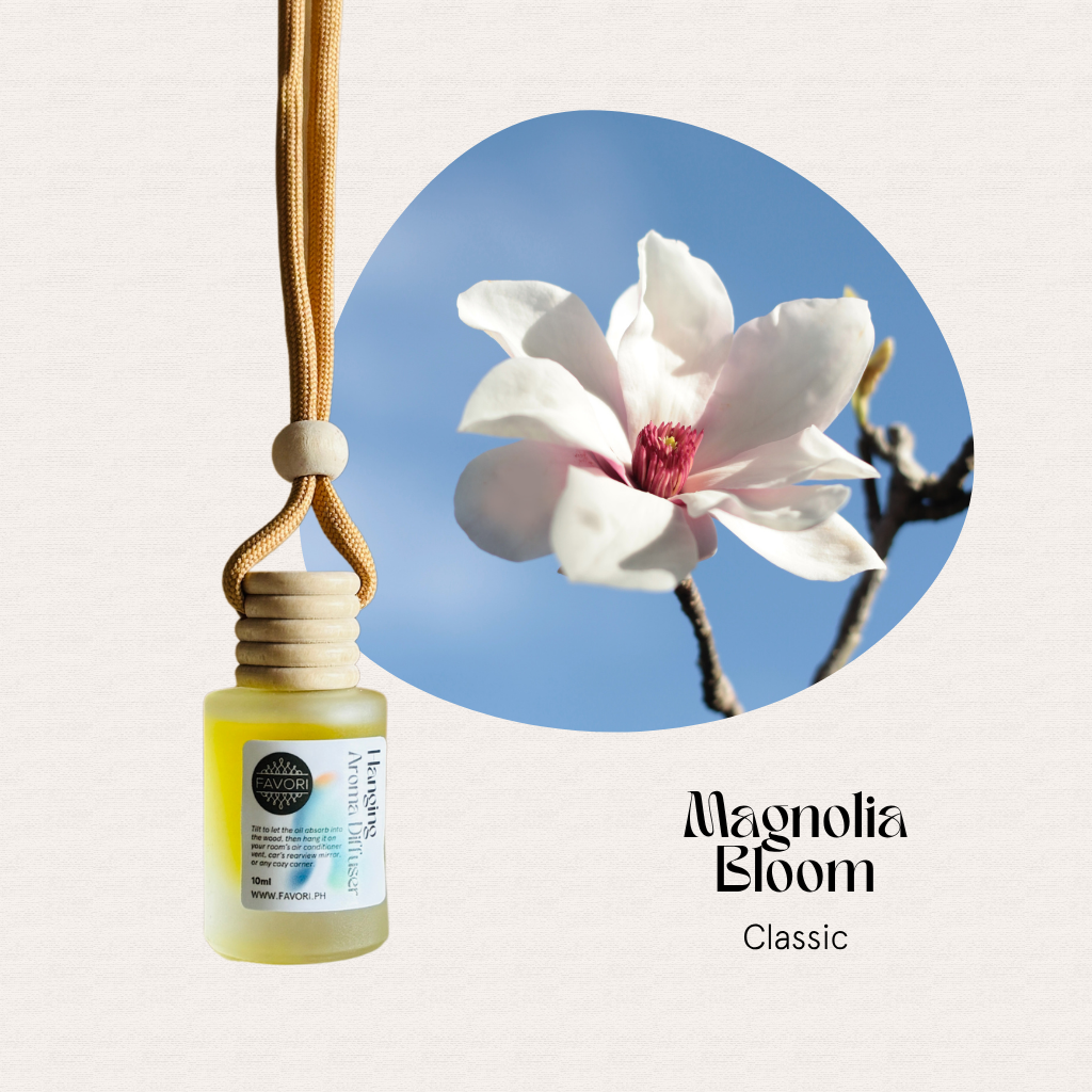 FAVORI Scents Hanging Aroma Diffusers (HAD) in Magnolia Bloom scent, with magnolias against a blue sky.