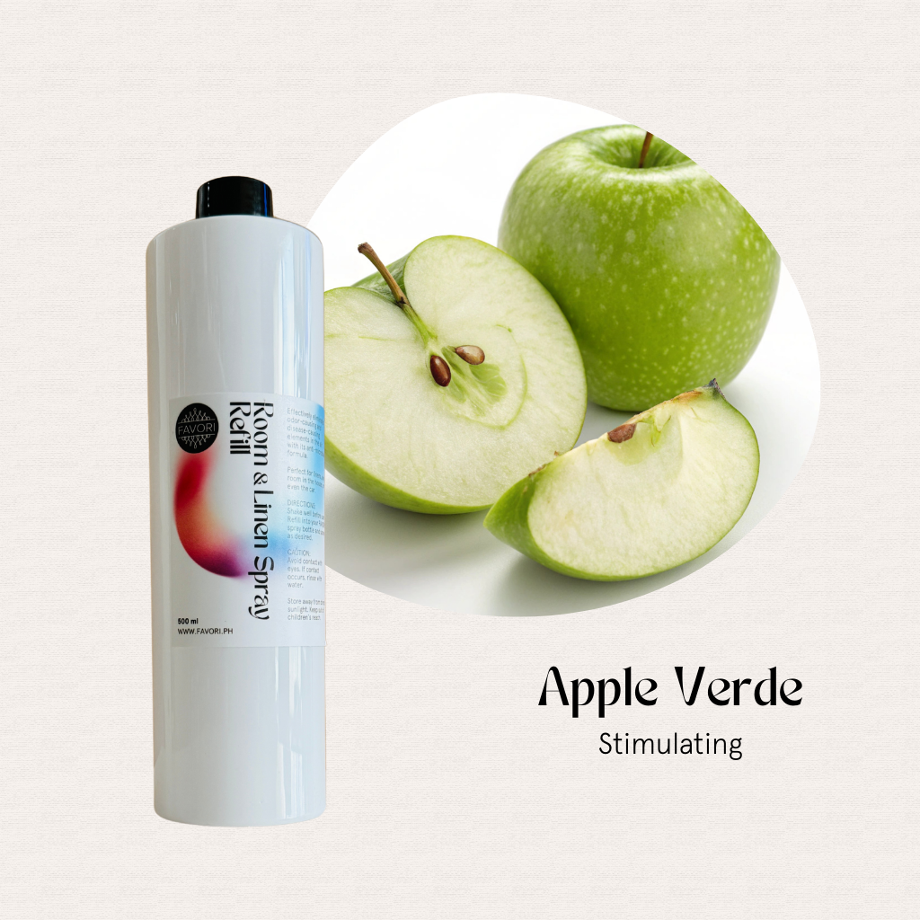 White spray bottle beside green apple slices with text FAVORI Scents Refill Air Spray 500ml on a light background.