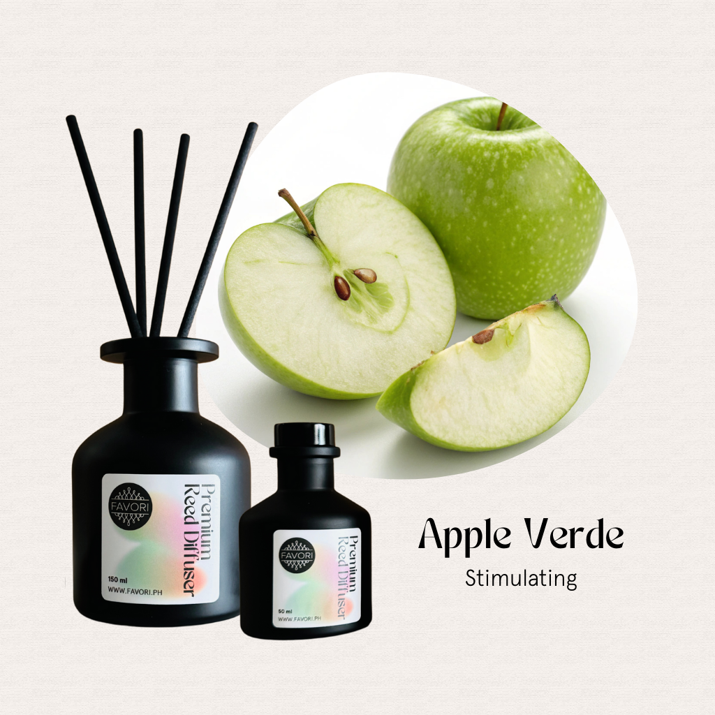 Black reed diffuser bottles and fresh green apples accentuate the Apple Verde Premium Reed Diffuser by FAVORI Scents.
