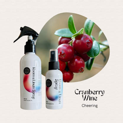 Two FAVORI Scents Regular Room & Linen Air Sprays, Cranberry Wine scent; text: Cheering, Odor Eliminator.