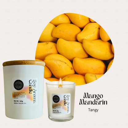 A lit FAVORI Scents All Occasion candle is shown beside fresh yellow mangoes in the background.