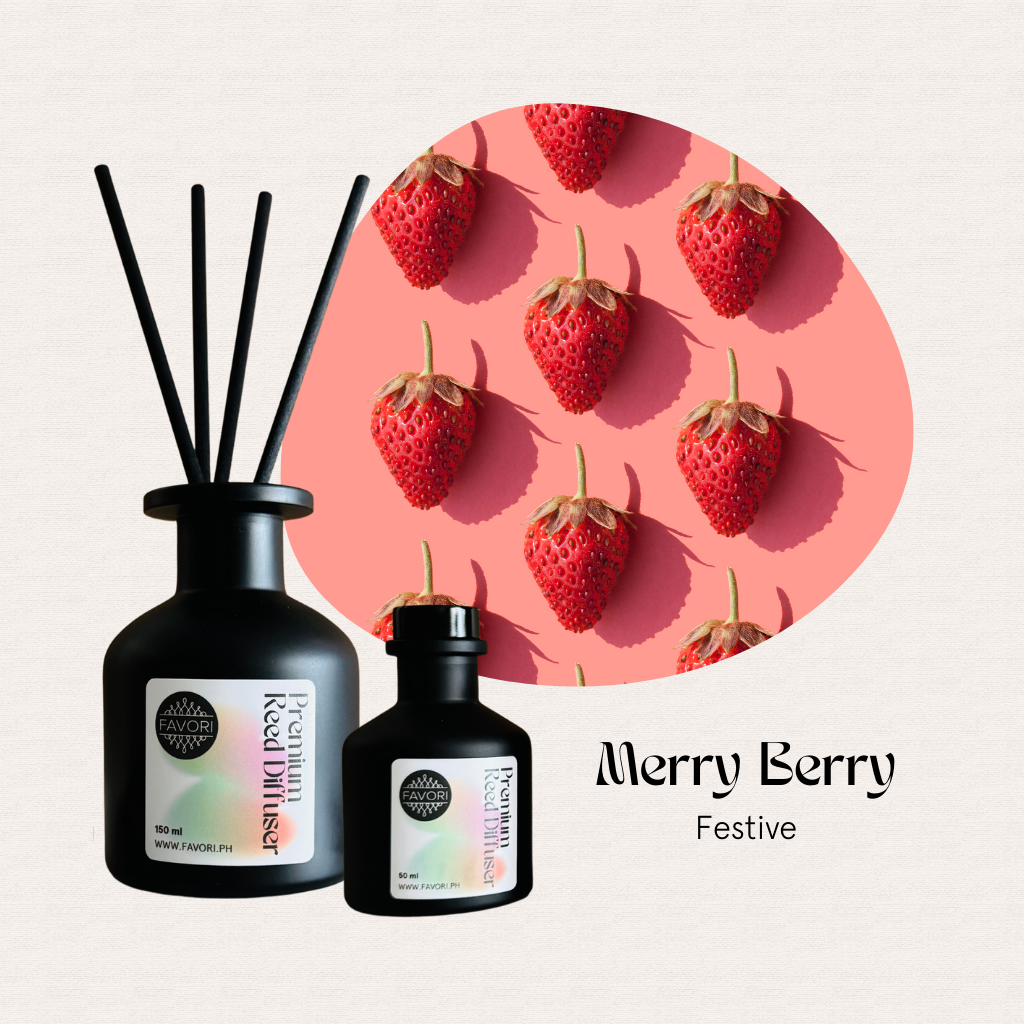 FAVORI Scents Merry Berry Premium Reed Diffuser offers a long-lasting aroma beside strawberries on pink.