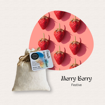 A FAVORI Scents PAD sits left of strawberries on a pink oval; text reads Merry Berry Festive.