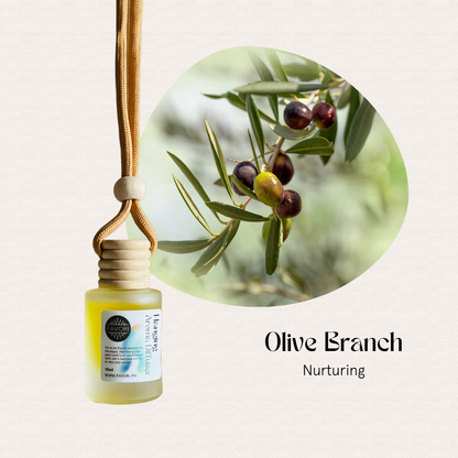 A FAVORI Scents Hanging Aroma Diffuser (HAD) labeled Olive Branch next to olives on a leafy branch.