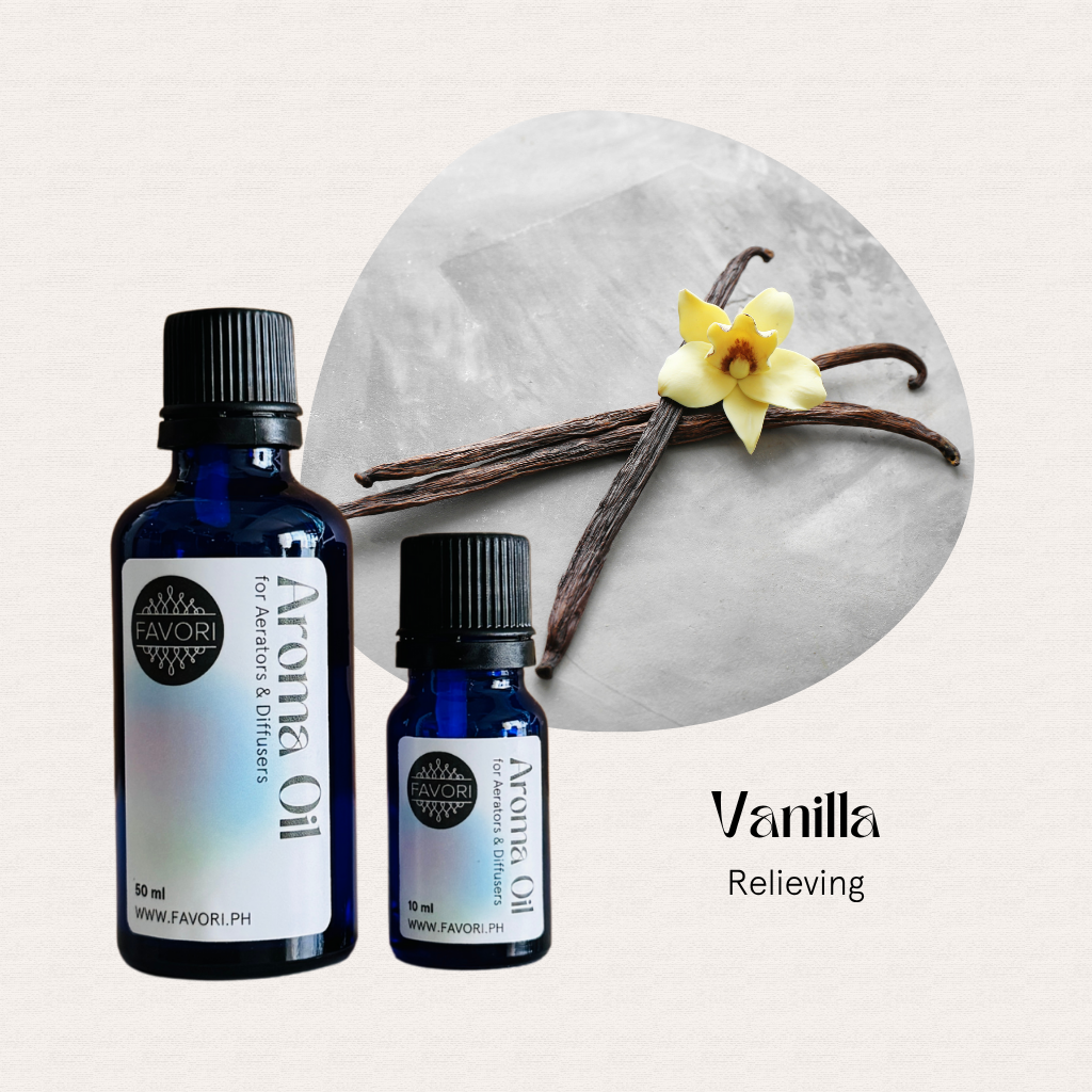 Two blue bottles of FAVORI Scents AD Aroma Oils in Vanilla beside pods and yellow vanilla flower, labeled Relieving.