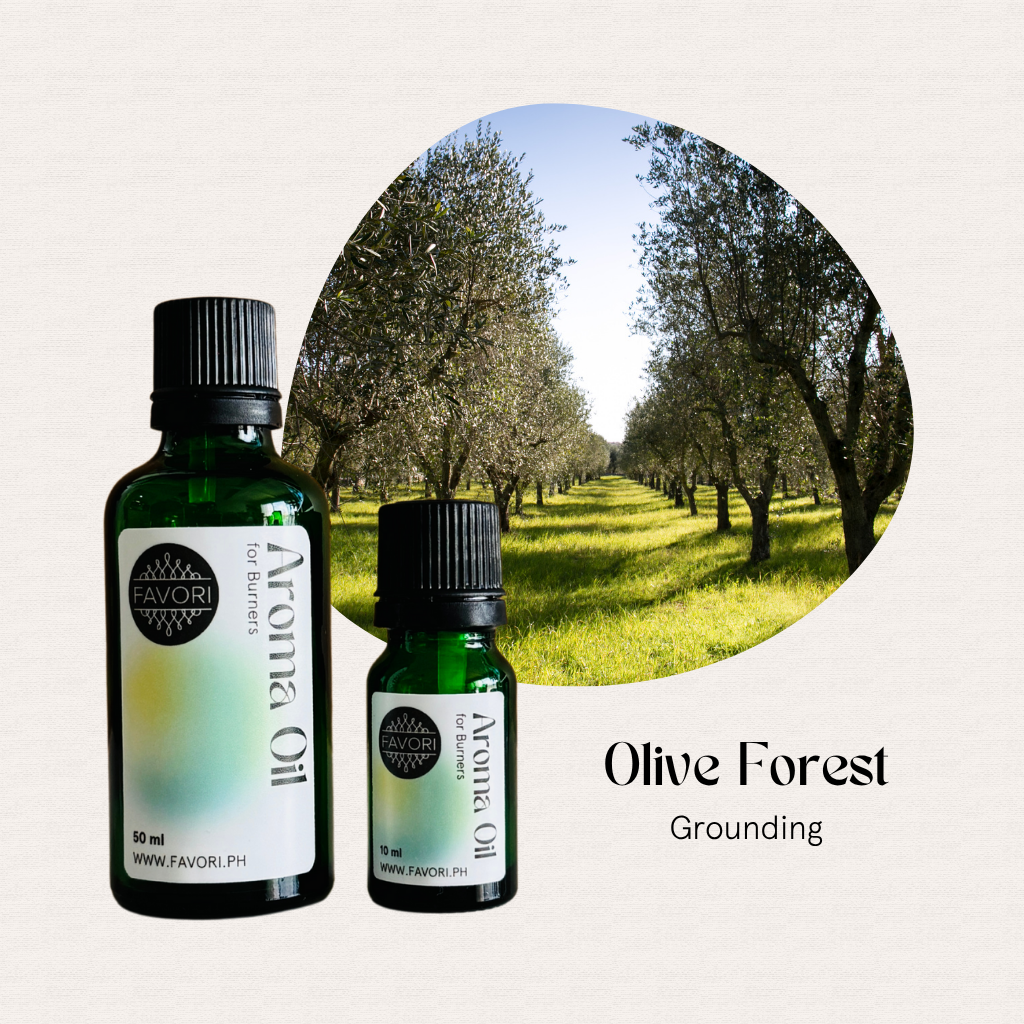 Two FAVORI Scents Burner Aroma Oils labeled Olive Forest - Grounding in front of olive trees.