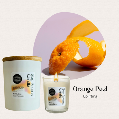 FAVORI Scents All Occasion: white jar soy candle with wooden lid, burning, orange peel scent.