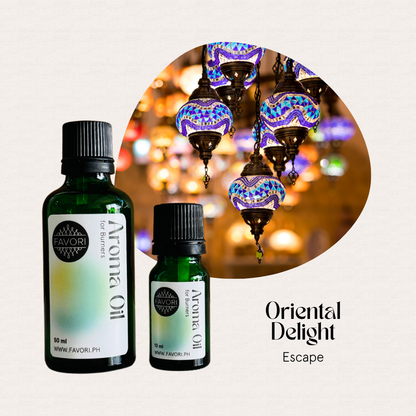 Two bottles of FAVORI Scents Burner Aroma Oils, labeled Oriental Delight Escape, with lanterns behind.